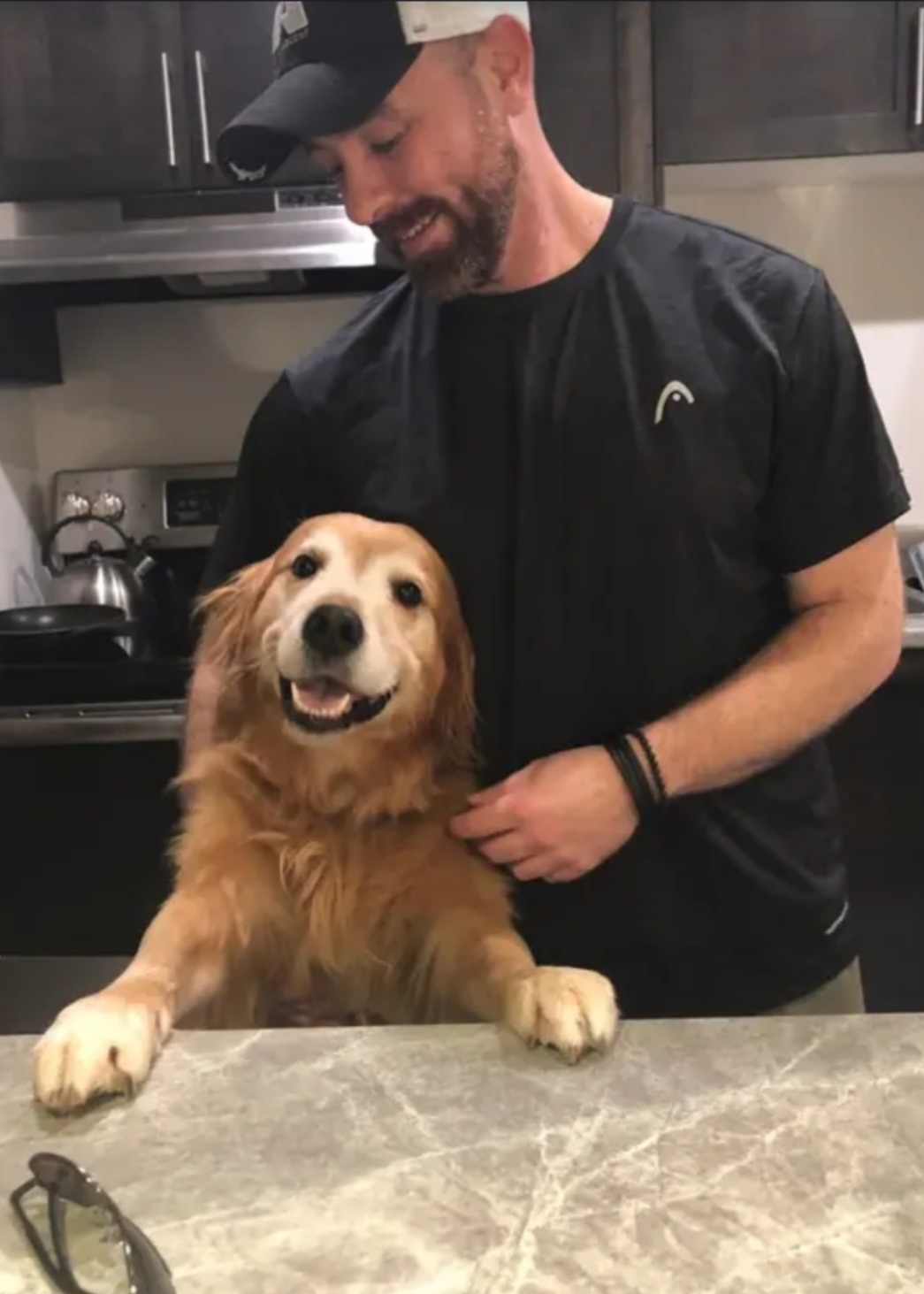 Kyle, FavourBee's founder, with his dog Fynn